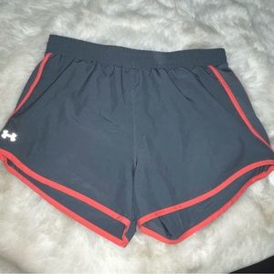 Grey and pink under armor shorts.